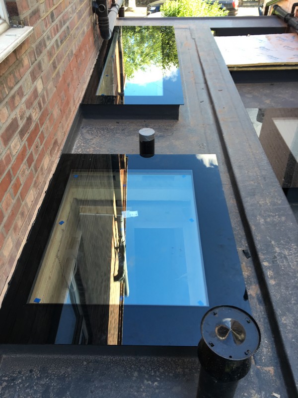 Multiple flat roof skylights on extension in Friern Barnet